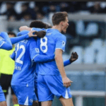 Napoli players celebrate with Conte